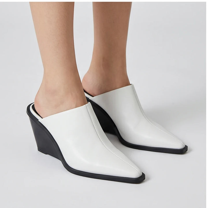 Model wearing White PU Valdis Genuine Leather Wedge Mules in studio - 3