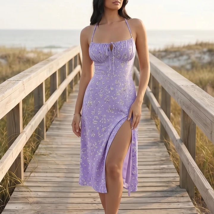 Model wearing Purple Seraphine Floral Midi Slip Dress outdoors