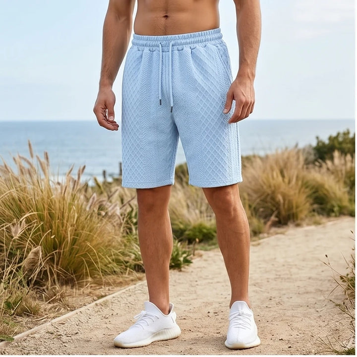 Model wearing Light Blue 2026 Summer Jacquard Texture Sports Shorts, Trendy Casual Five-point Pants For Men outdoors