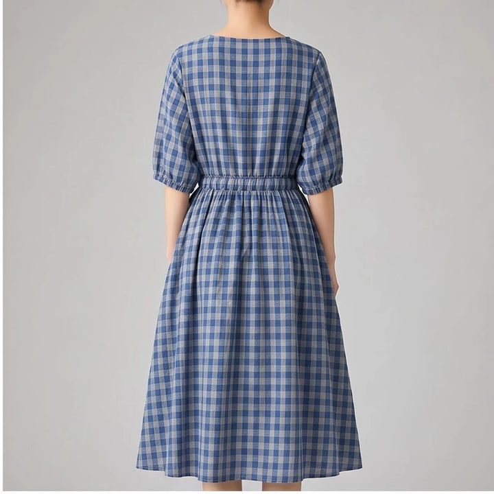 Model wearing Blue Elara Check Midi Dress in studio - 2