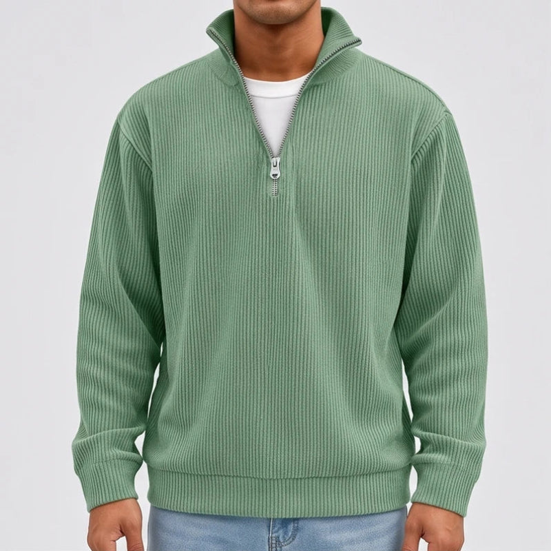 Model wearing Green corduroy pullover in a studio