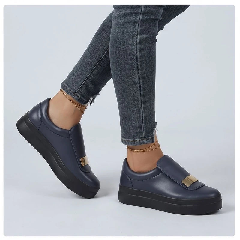 Model wearing Blue metal sneakers in a studio
