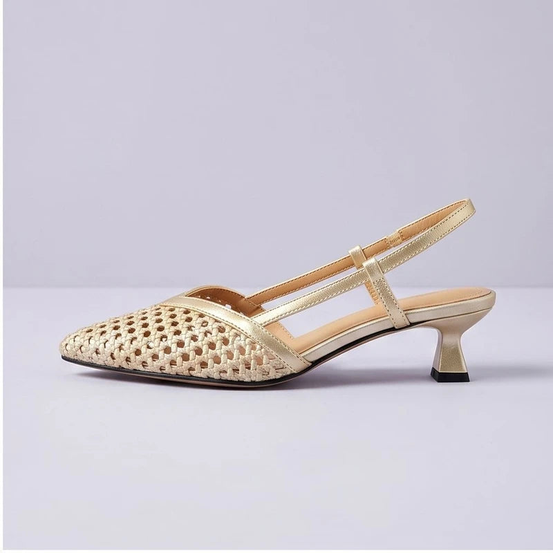 Gold woven sandals in a studio background - 2
