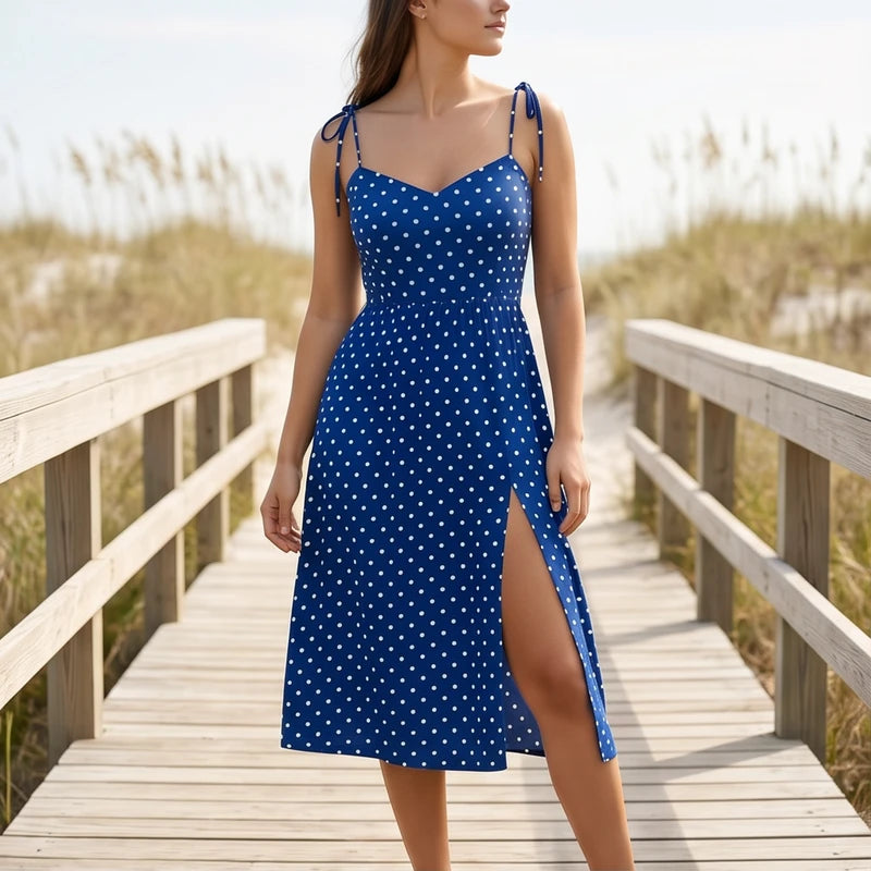 Model wearing Blue Cortez Polka Dot Midi Dress outdoors