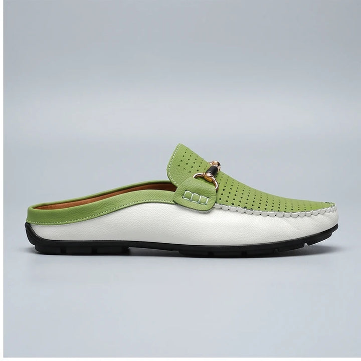 Green leather loafers in a studio background - 2