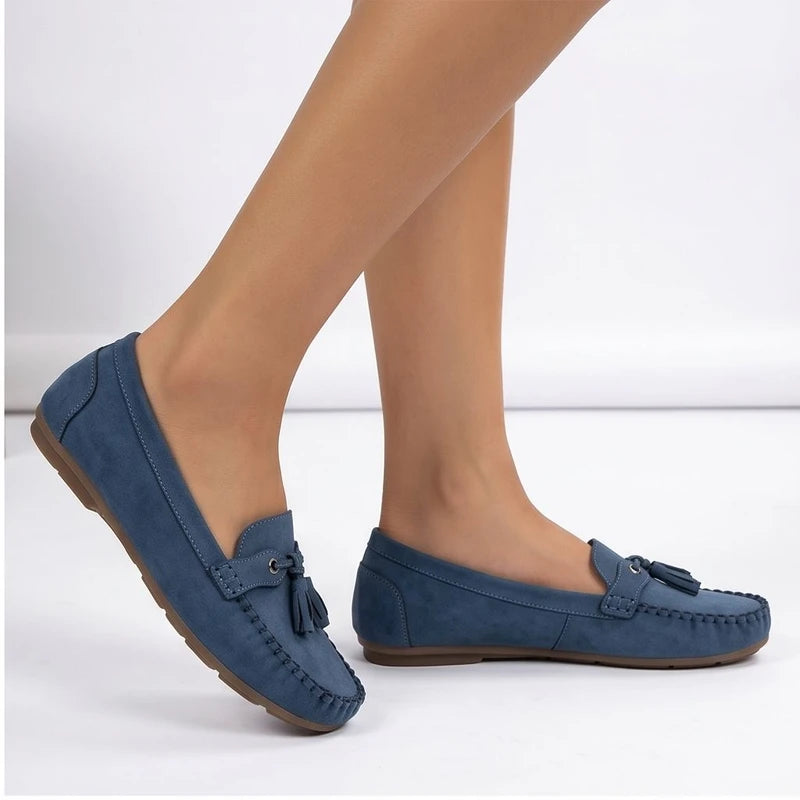 Model wearing Blue loafers in a studio - 2