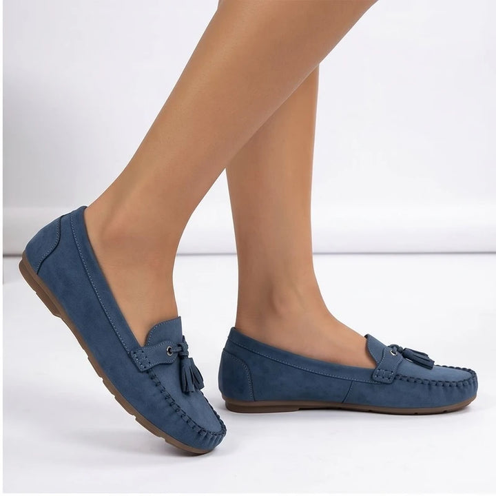 Model wearing Blue loafers in a studio - 2