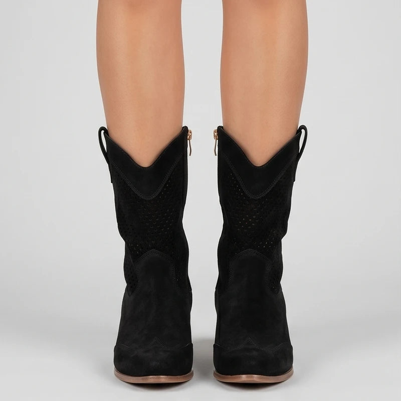 Model wearing Black Gideon Suede Western Ankle Boots in studio