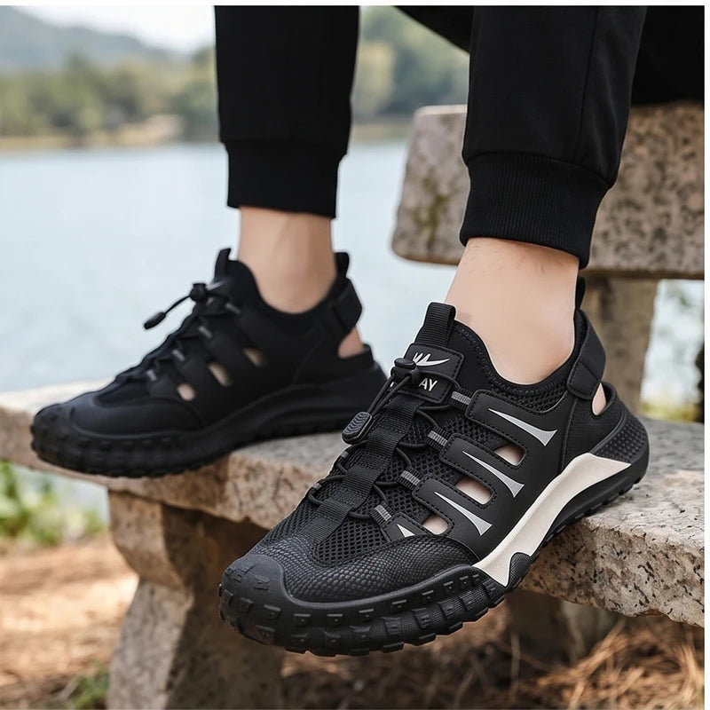 Model wearing Black 2026Men Beach Breathable Sandals Designer Brand Mesh Hollow-out Casual Shoes Outdoor Lightweight Non Slip Reman Sneakers for Men outdoors - 3