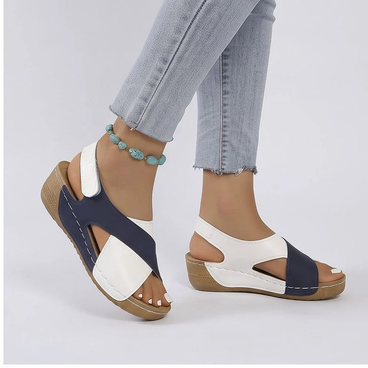 Model wearing Blue sandals in a studio - 2