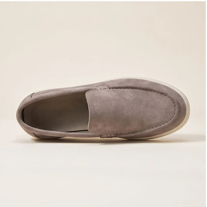brown1 suede loafers in a studio background - 3