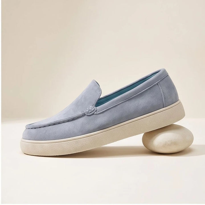 Blue1 suede loafers in a studio background - 2