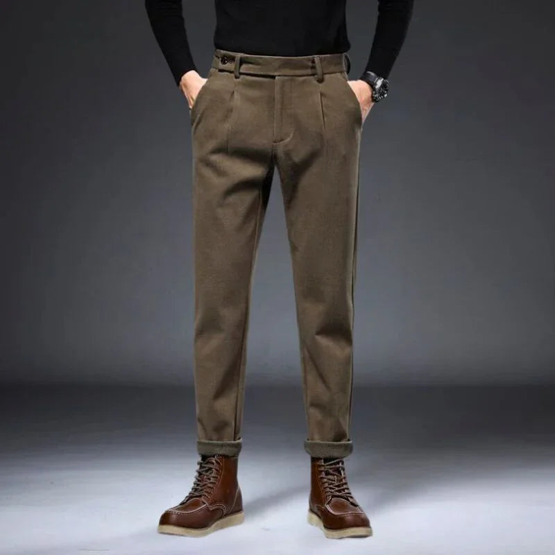 Hudson tailored trousers in brown with a refined fit, stylishly paired with leather boots, showcasing a polished look.