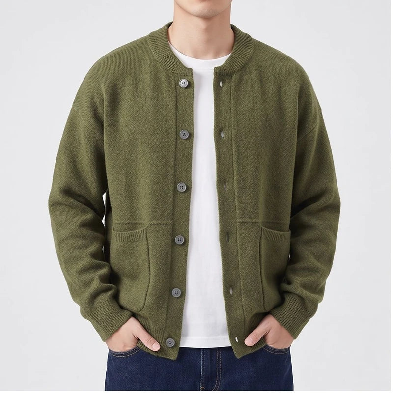 Model wearing Green knitted cardigan in a studio