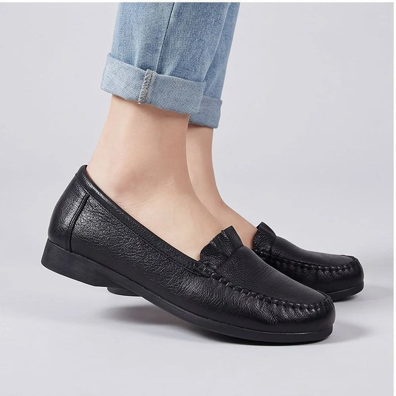 Model wearing Black leather loafers in a studio - 3