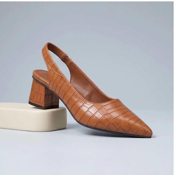 Brown heels in a studio background - 3