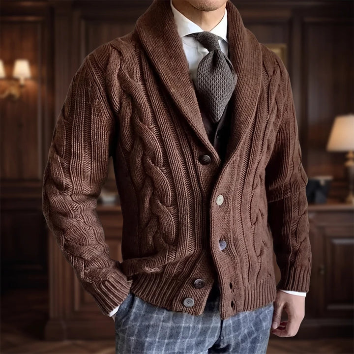 brown knitted cardigan in a dark wood interior
