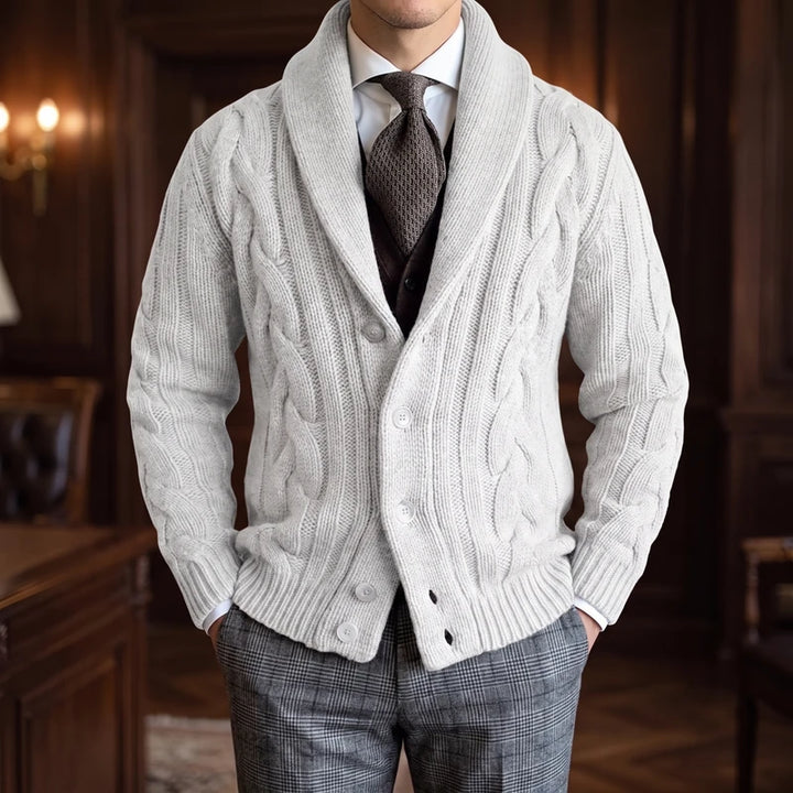 White knitted cardigan in a dark wood interior