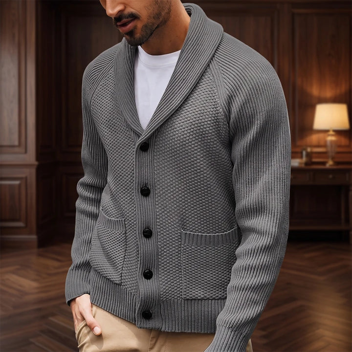 Dark Grey knitted sweater in a dark wood interior