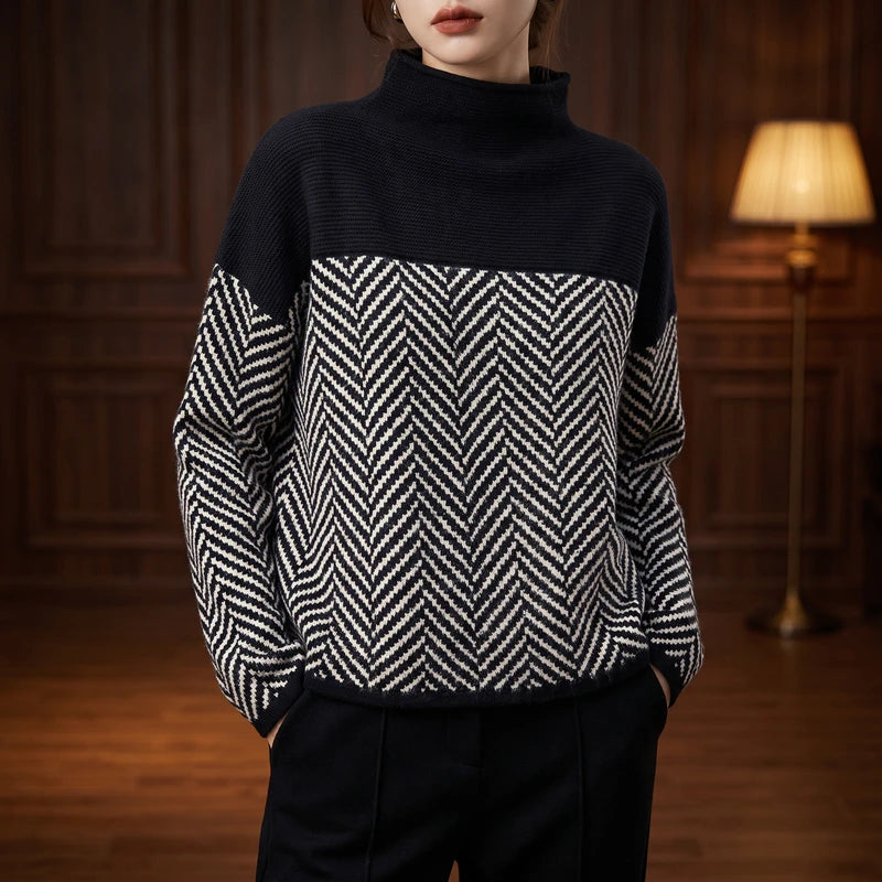 Black knit sweater in a dark wood interior