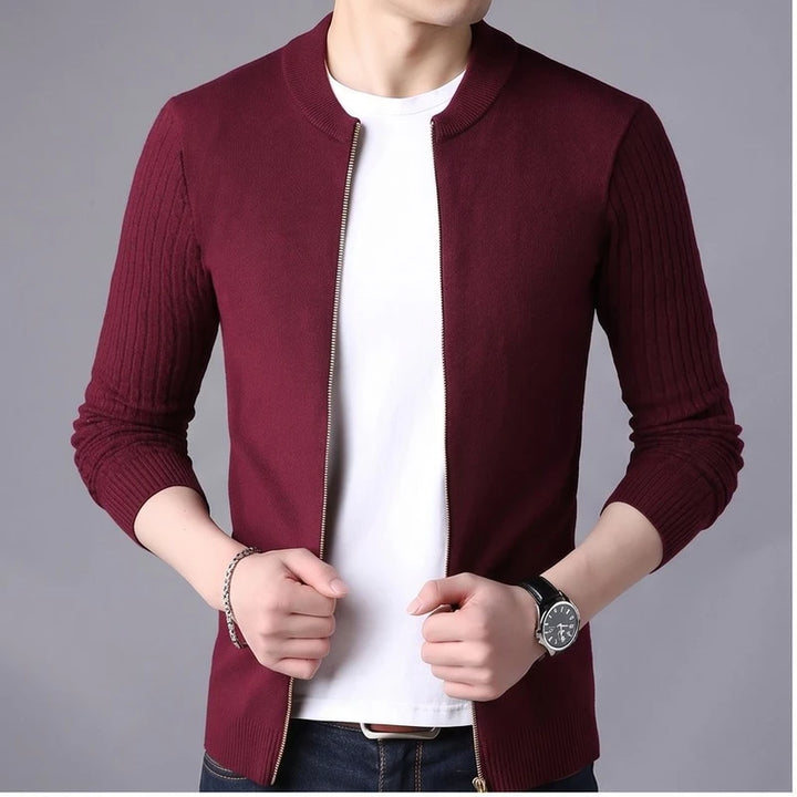 Model wearing Burgundy knit cardigan in a studio