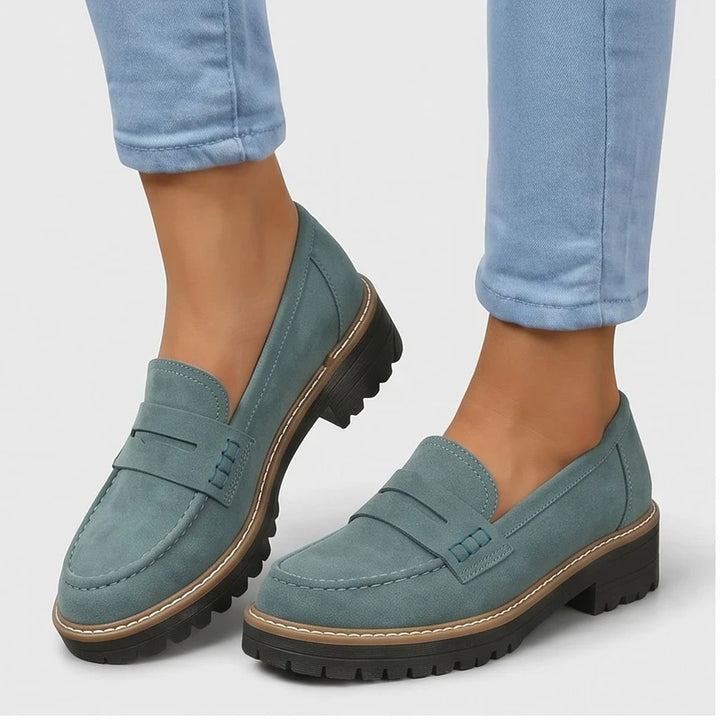 Model wearing Green Brynn Suede Penny Loafers  [needs new images] in studio