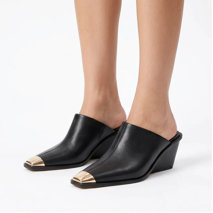 Model wearing Black Bardot Genuine Leather Square Toe Mules in studio