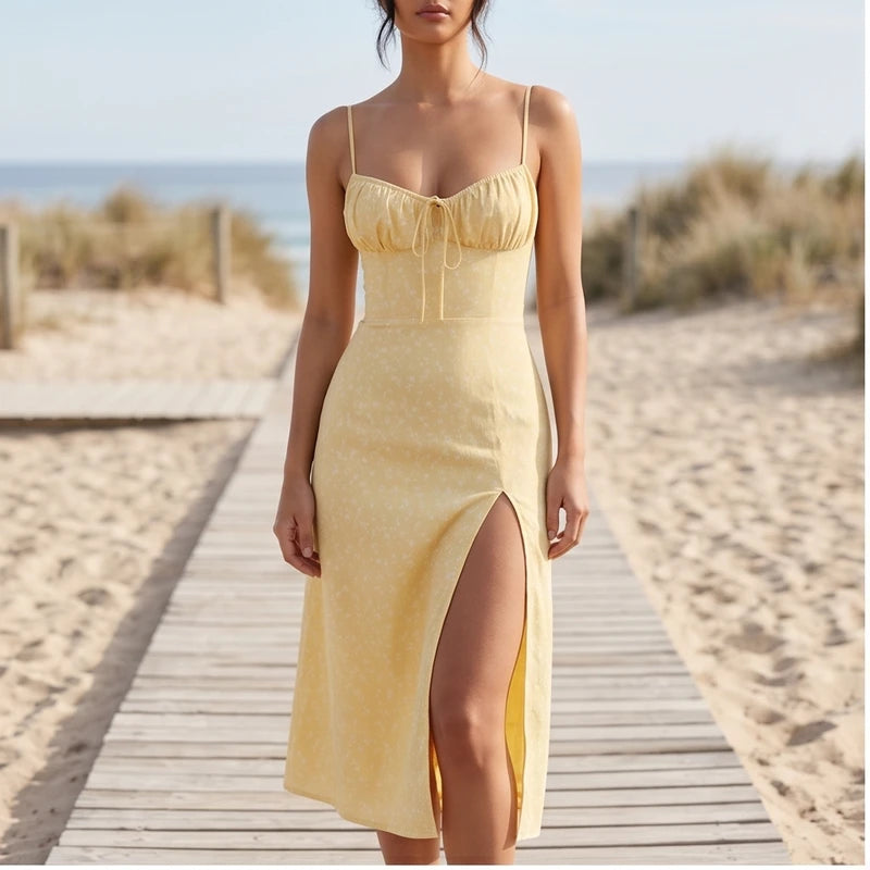 Model wearing Yellow Seraphine Floral Midi Slip Dress outdoors