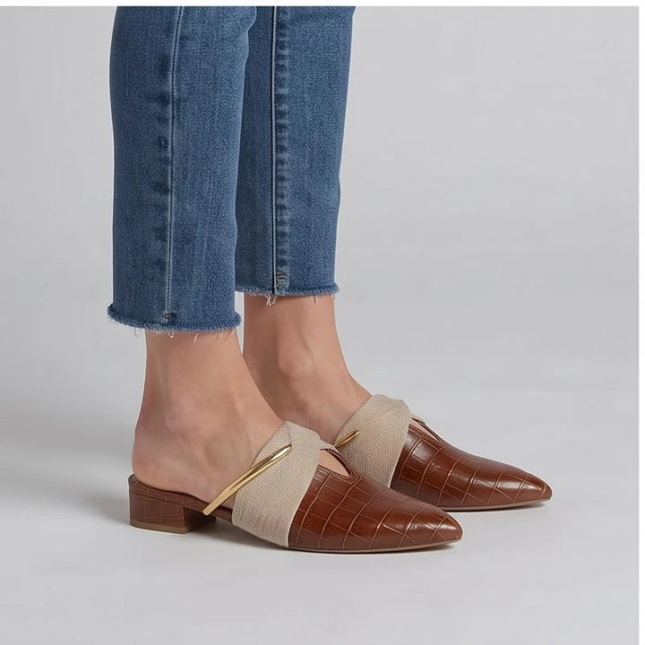 Model wearing Ivory Cream mule in a studio - 2