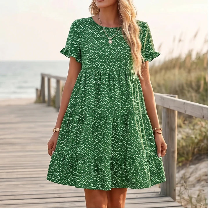 Model wearing Green Dotted Mini A-Line Sundress with Short Sleeves outdoors