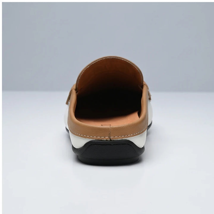 Khaki leather loafers in a studio background - 3