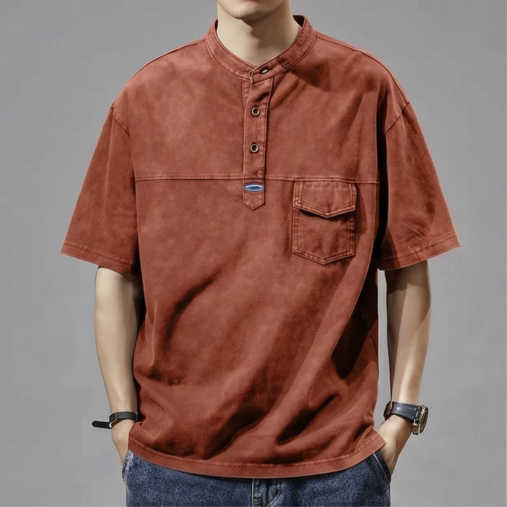 Model wearing Rust Renn Faded Mandarin Collar Shirt in studio