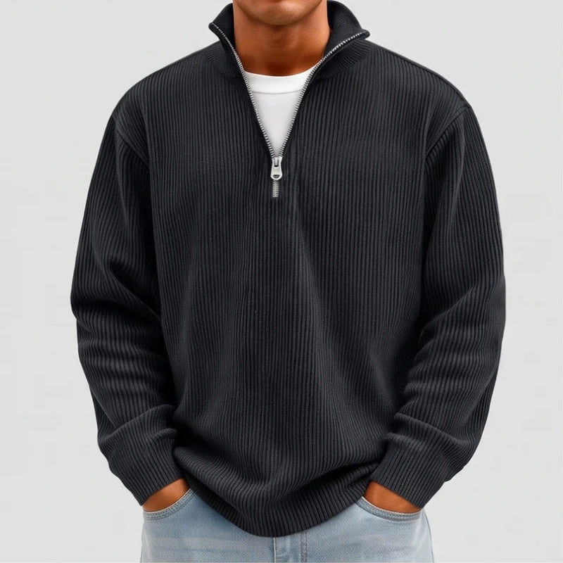 Model wearing Black corduroy pullover in a studio