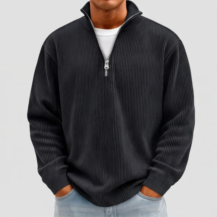 Model wearing Black corduroy pullover in a studio