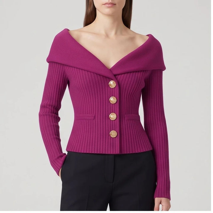 Model wearing purple knitted jacket in a studio