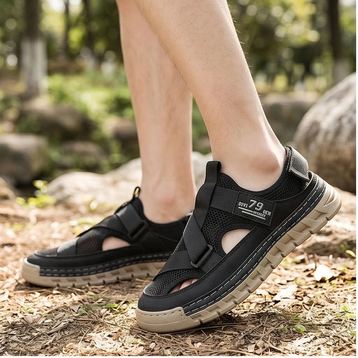 Model wearing Black Ridgeway Mesh Sport Sandals outdoors