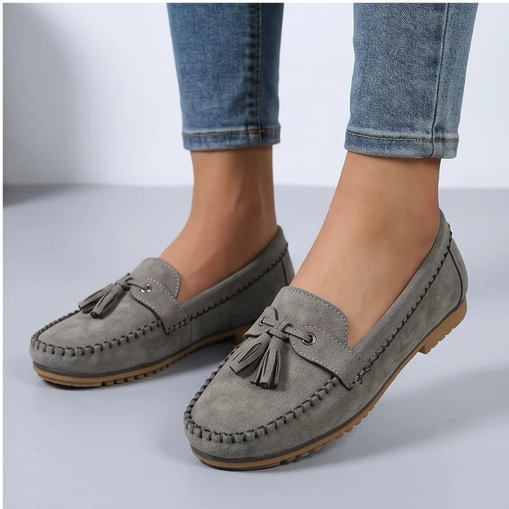 Model wearing Gray loafers in a studio - 3