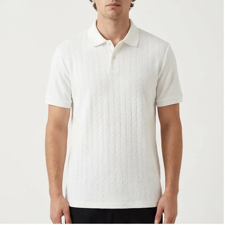 Model wearing White Ashby Textured Knit Polo Shirt in studio