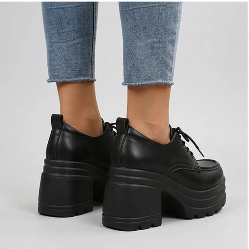 Model wearing Black Veya Chunky Platform Leather Boots in studio - 3
