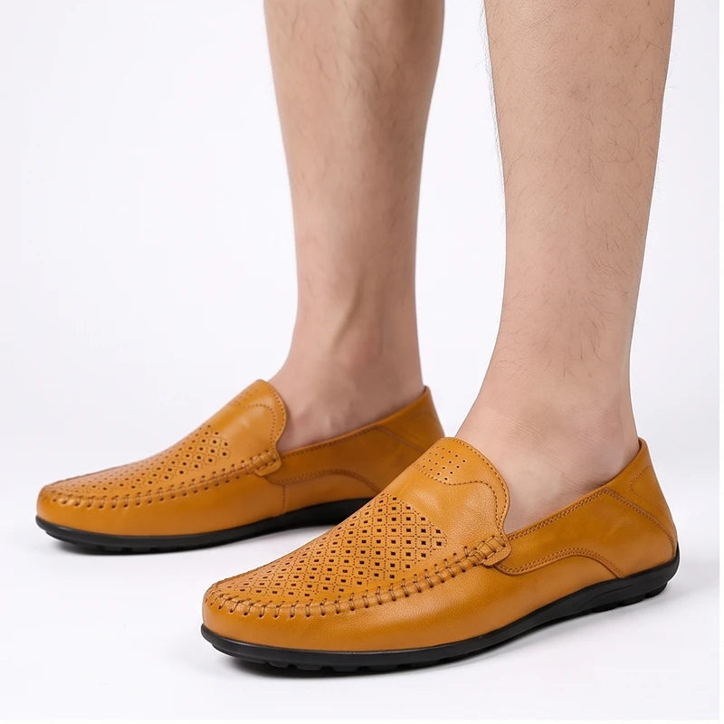 Model wearing Tan leather loafers in a studio