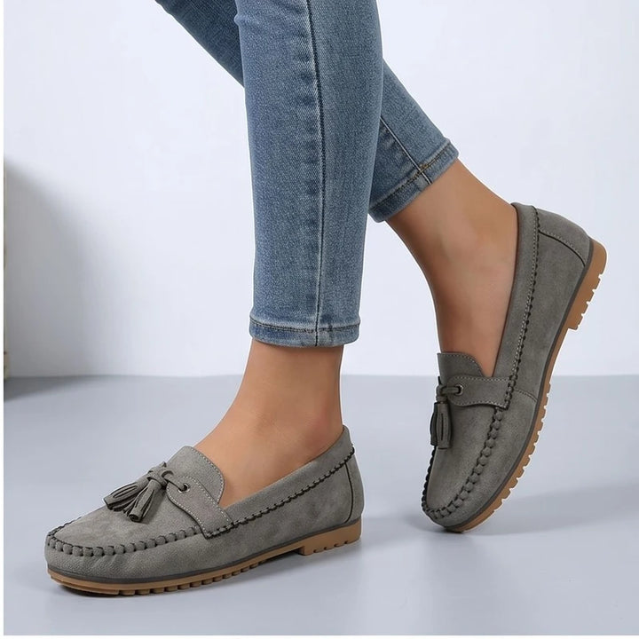 Model wearing Gray loafers in a studio - 2