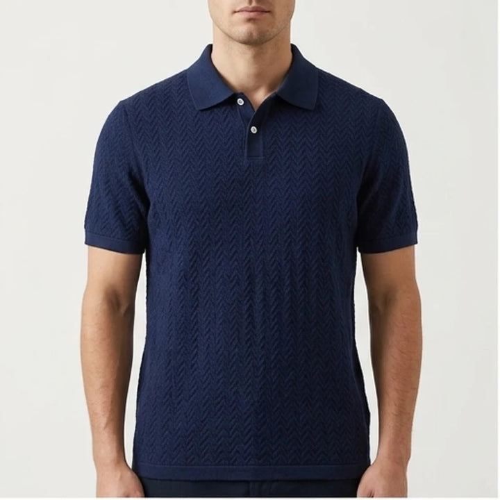 Model wearing Navy Ashby Textured Knit Polo Shirt in studio