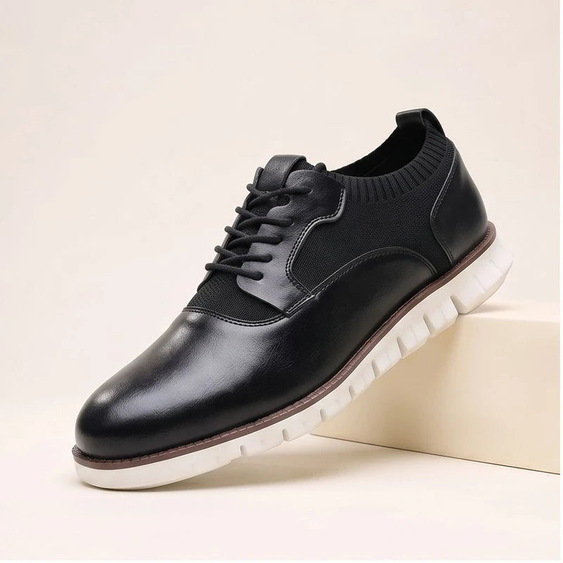 Black woven shoes in a studio background