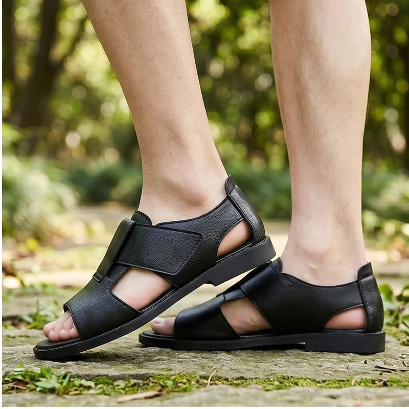 Model wearing black Kestrel Genuine Leather Gladiator Sandals outdoors - 2