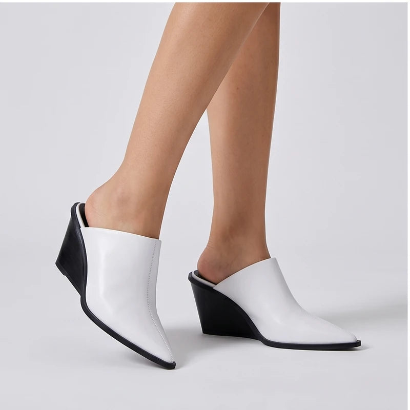 Model wearing White cowhide Valdis Genuine Leather Wedge Mules in studio - 3