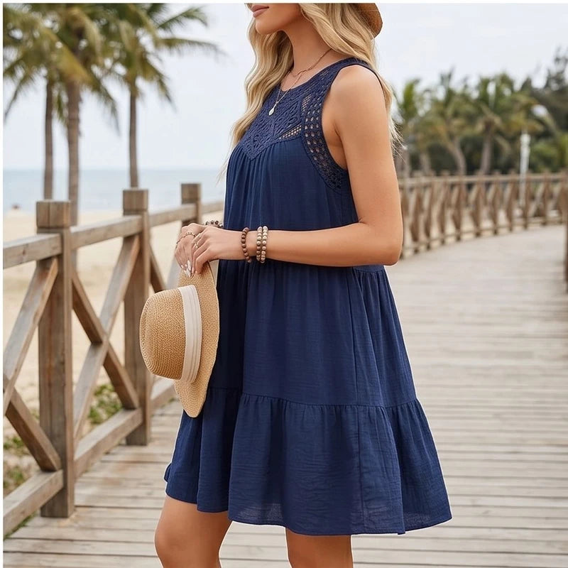 Model wearing Navy Azura Cotton Crochet Tiered Dress outdoors - 2