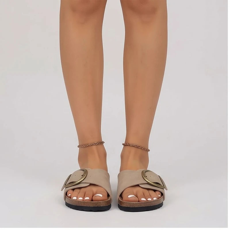 Model wearing Khaki sandals in a studio