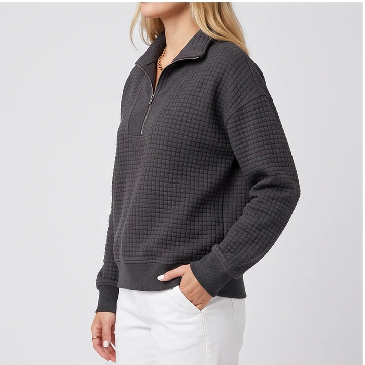 Model wearing Black knit pullover in a studio - 2