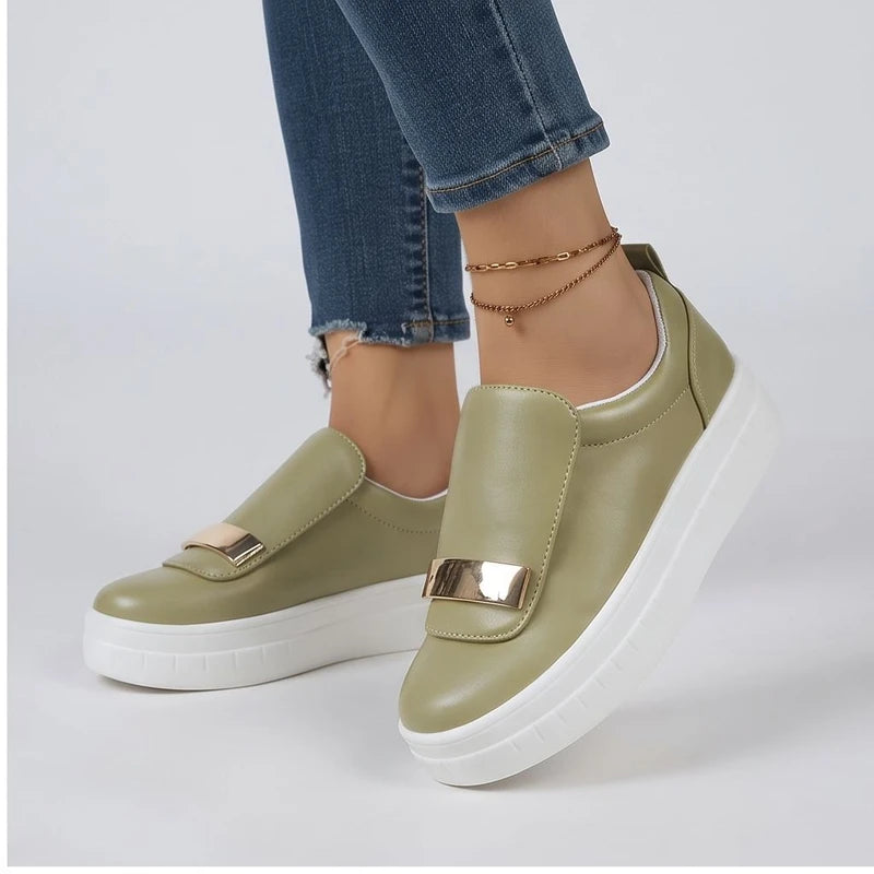 Model wearing Green sneakers in a studio