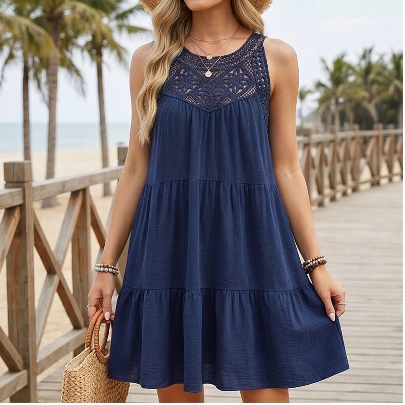 Model wearing Navy Azura Cotton Crochet Tiered Dress outdoors